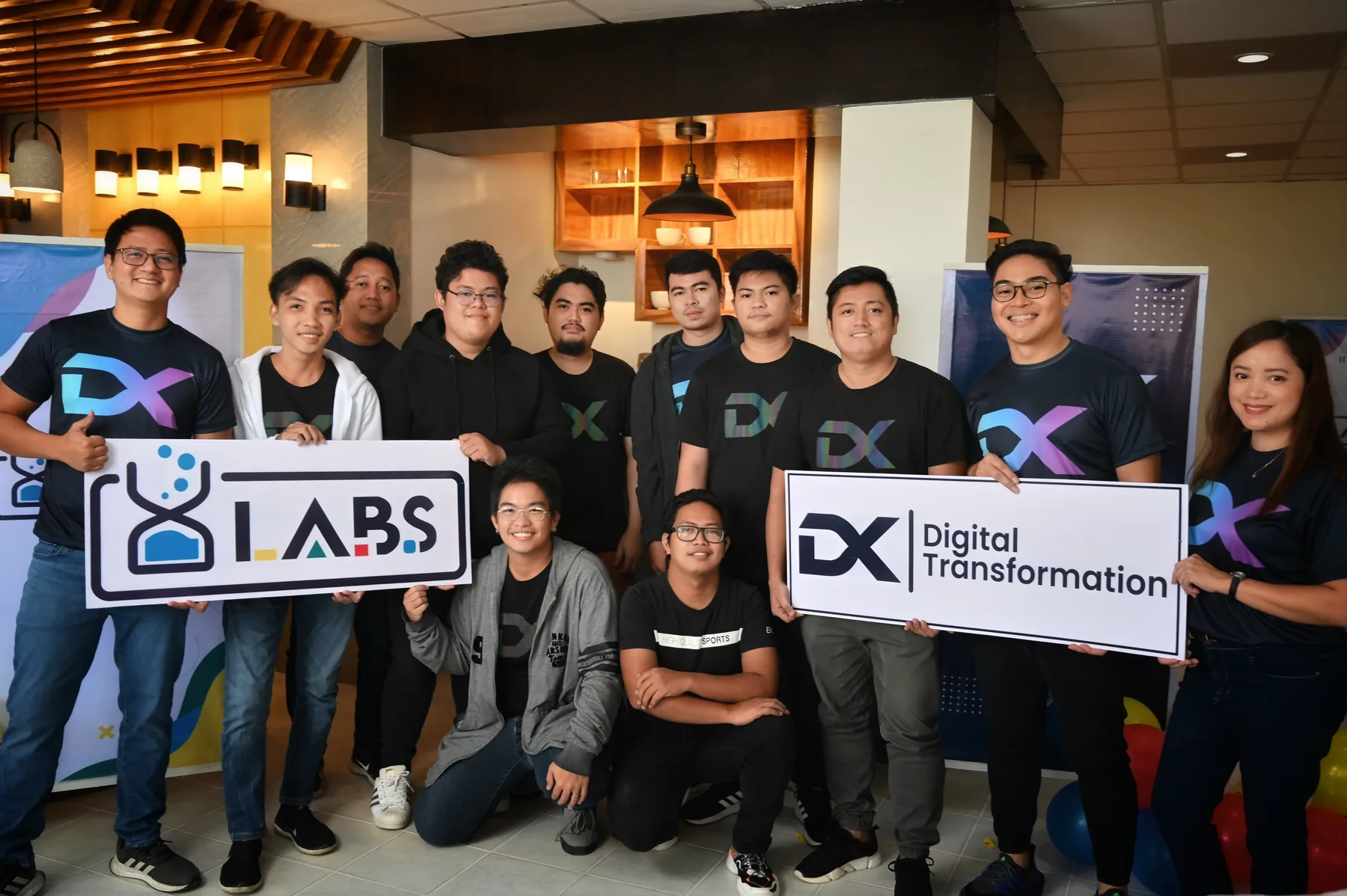 The DXFORM team collaborating at a company event
